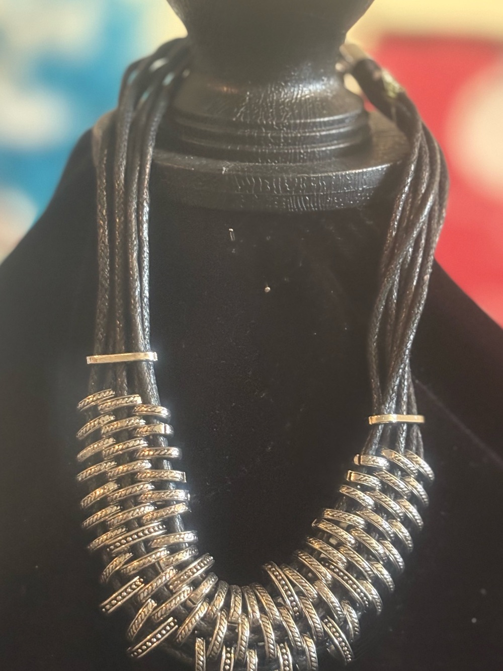 Multi- Strand Black Cord Necklace with Silver Rings